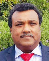 Dr Madan Ravikumar
